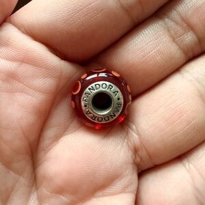 Original Pandora charm. Red/orange Murano. Used; excellent conditions.